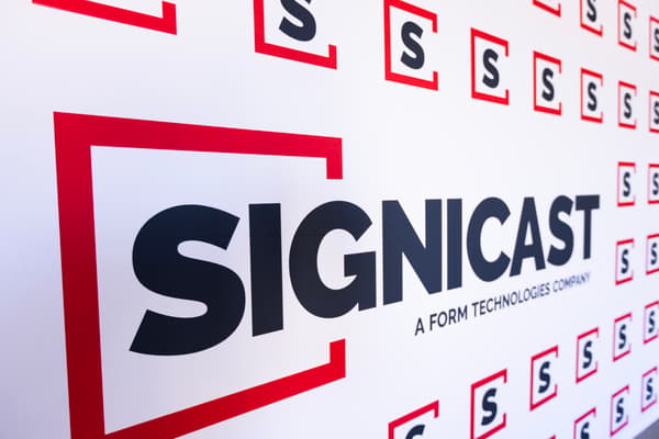 Signcast logos on a wall at the MFC ribbon cutting event